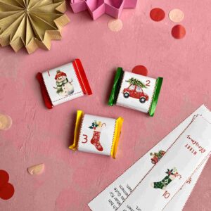Die Banderolen für den DIY Adventskalender mit Witz lassen sich nicht nur für Ritter Sport Minis, sondern auch für Tee und After Eights wunderbar verwenden.
